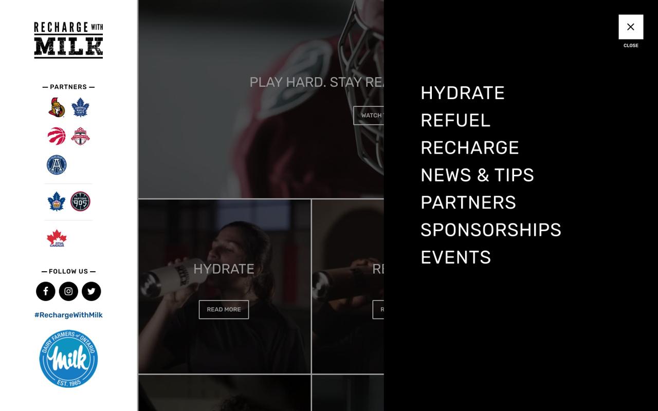 The Recharge With Milk website with its full-screen navigation menu open